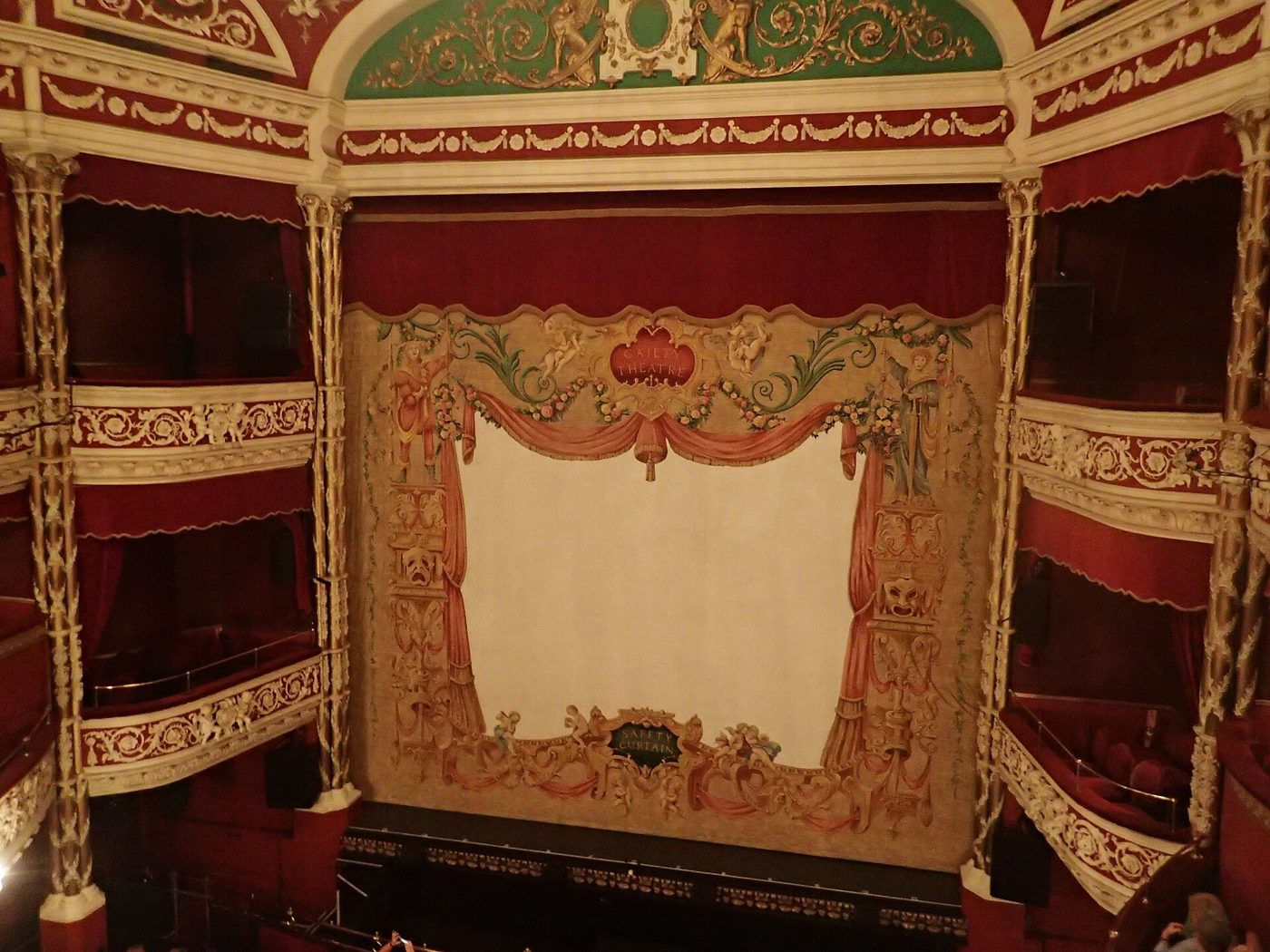 The Gaiety Theatre's gilded boxes and stage curtain